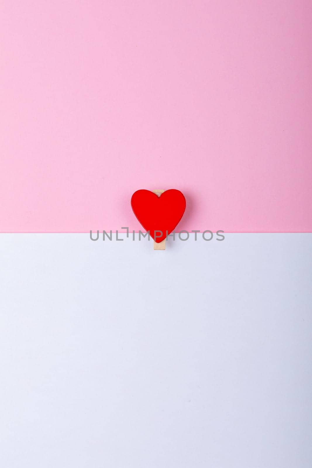 Overhead view of heart shape on pink and white background, copy space by Wavebreakmedia