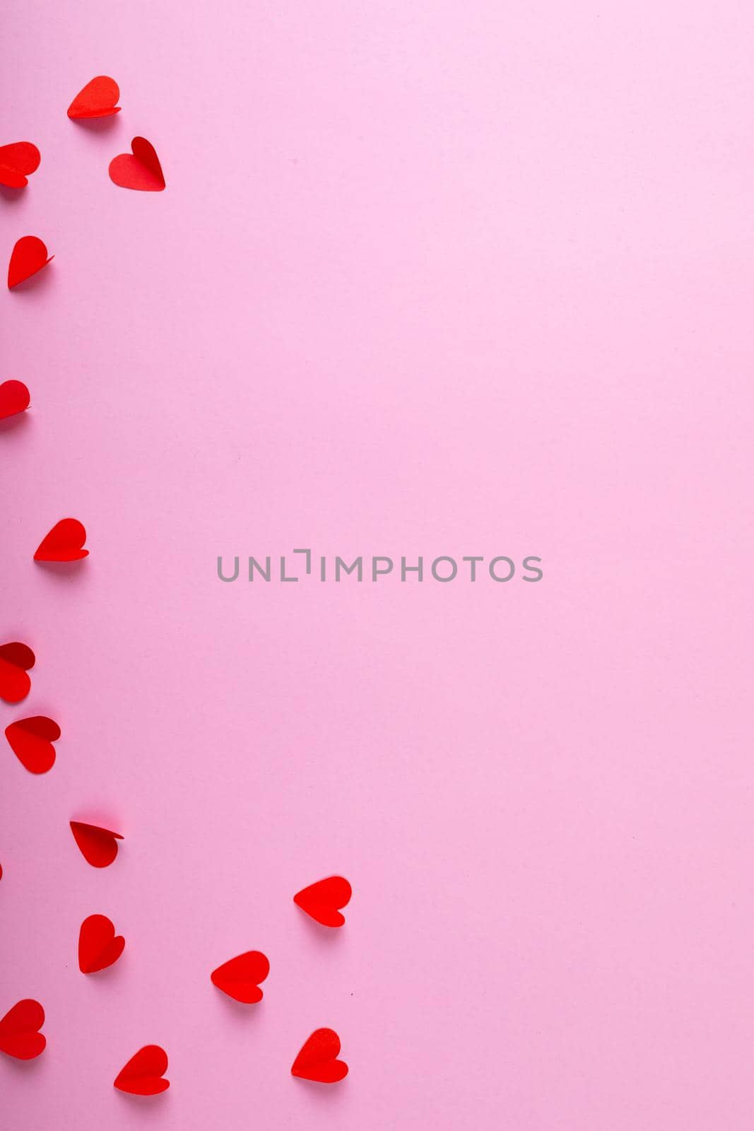 Directly above shot of heart shaped decoration on pink background, copy space. valentine's day and love concept.