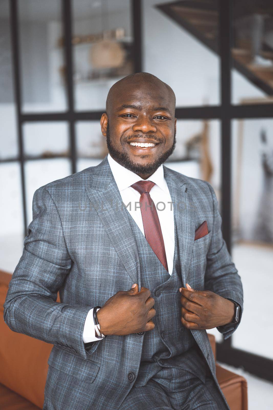 Successful Young Businessman. African American Guy In Stylish Expensive Suit Folded His Palms Together Looking Directly Into Camera. Concept Of Victory, Personal Growth. High quality photo