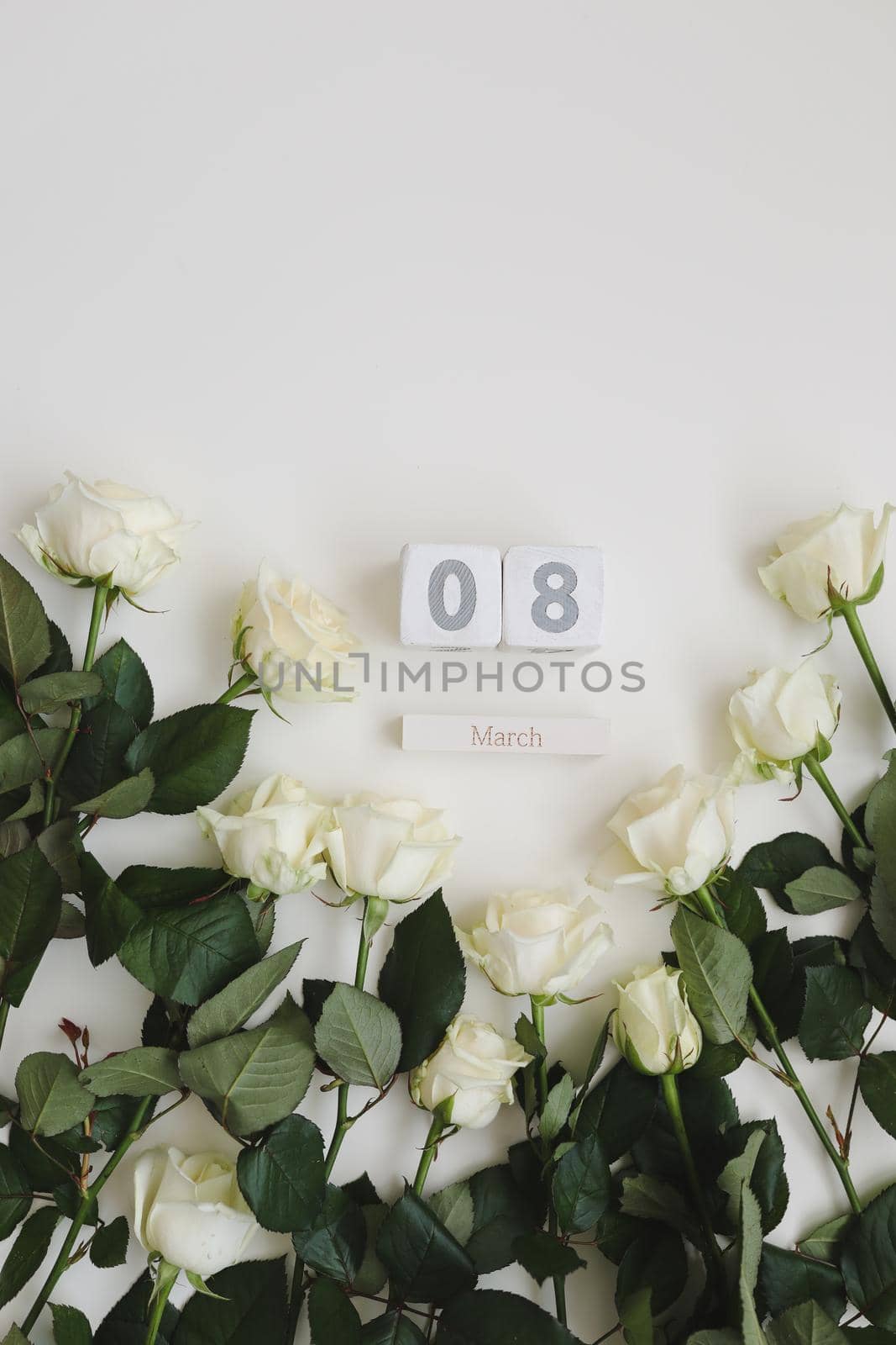 8 March, Woman Day background with white roses and place for text on white background top view by paralisart
