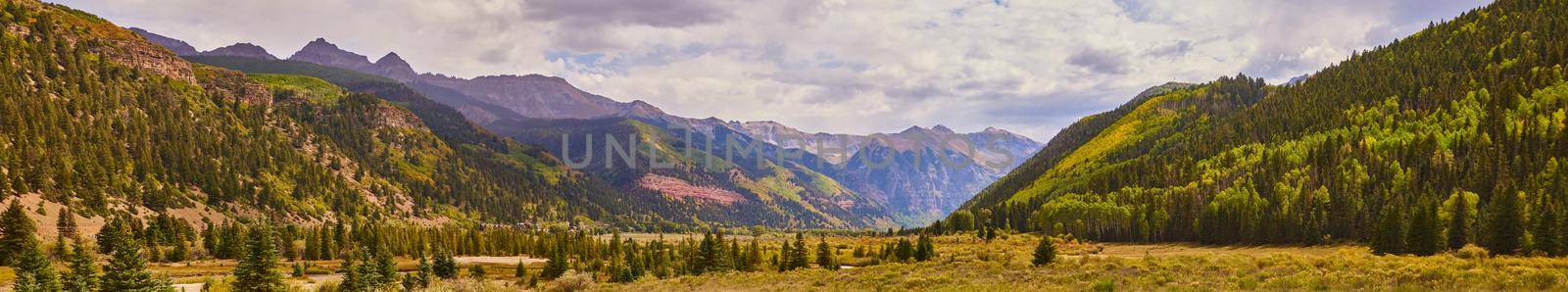 Image of Panorama of vast valley surrounded by mountains