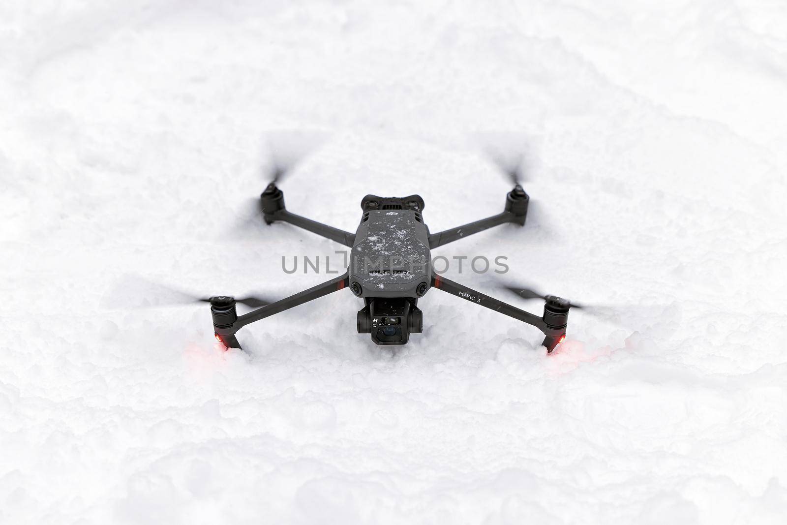 New DJI Mavic 3 on snow, takeoff in snow conditions. DJI Mavic 3 one of the most portable drones in the market, with Hasselblad camera. 25.01.2022 Rostov-on-Don, Russia by EvgeniyQW
