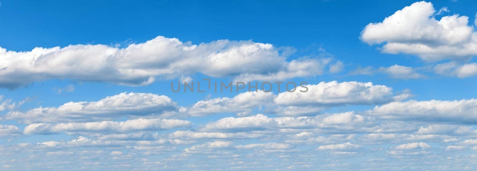 Beautiful panorama of the sky. Panorama of the sky in the clouds. Clouds float across the blue sky by EvgeniyQW