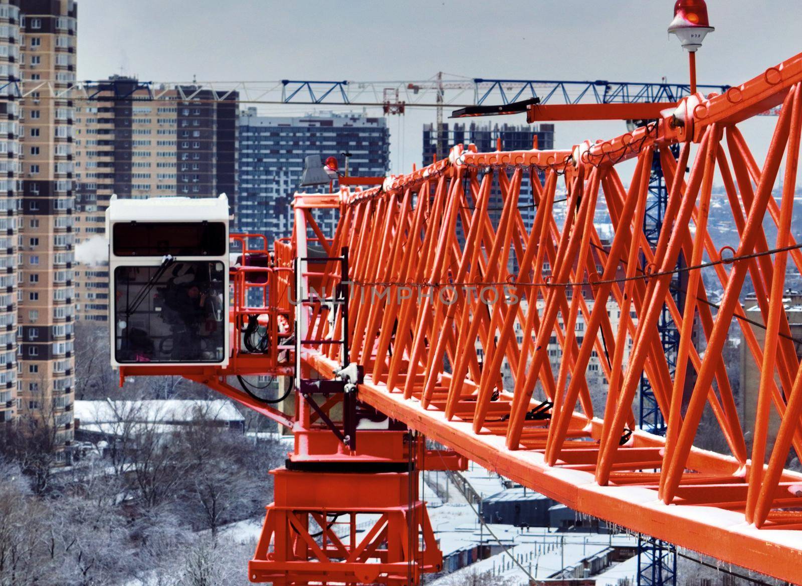 Construction Crane from Above. tower crane on the construction site aerial view. Aerial View Of construction site with crane. Construction workers are building. Top view by EvgeniyQW