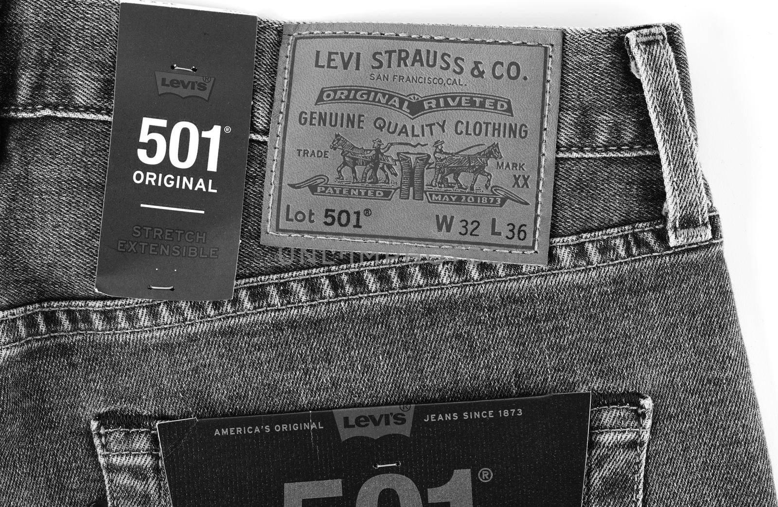Levi's logo and badges is displayed on Levi Strauss 501 jeans. New LEVI'S 501 Jeans. Classic jeans model. LEVI'S is a brand name of Levi Strauss and Co, founded in 1853. 31.12.2021, Rostov, Russia by EvgeniyQW