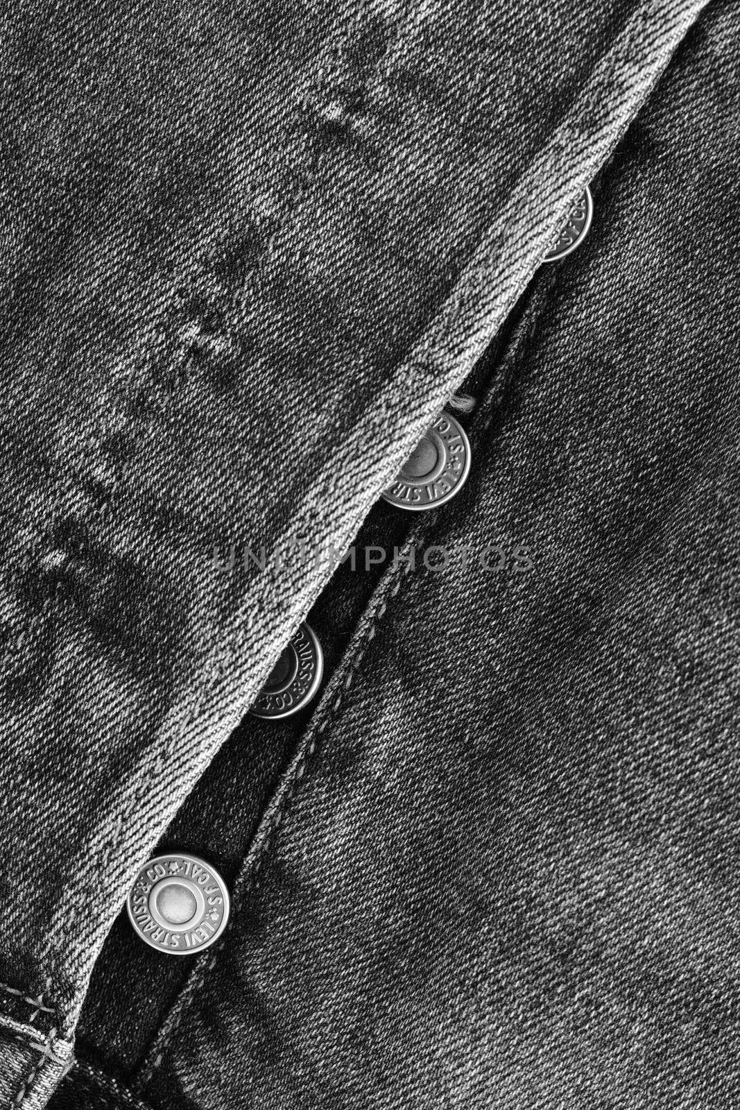 Close up of the details of new LEVI'S 501 Jeans. Buttons and seams close-up. Classic jeans model. LEVI'S is a brand name of Levi Strauss and Co, founded in 1853. 31.12.2021, Rostov, Russia by EvgeniyQW