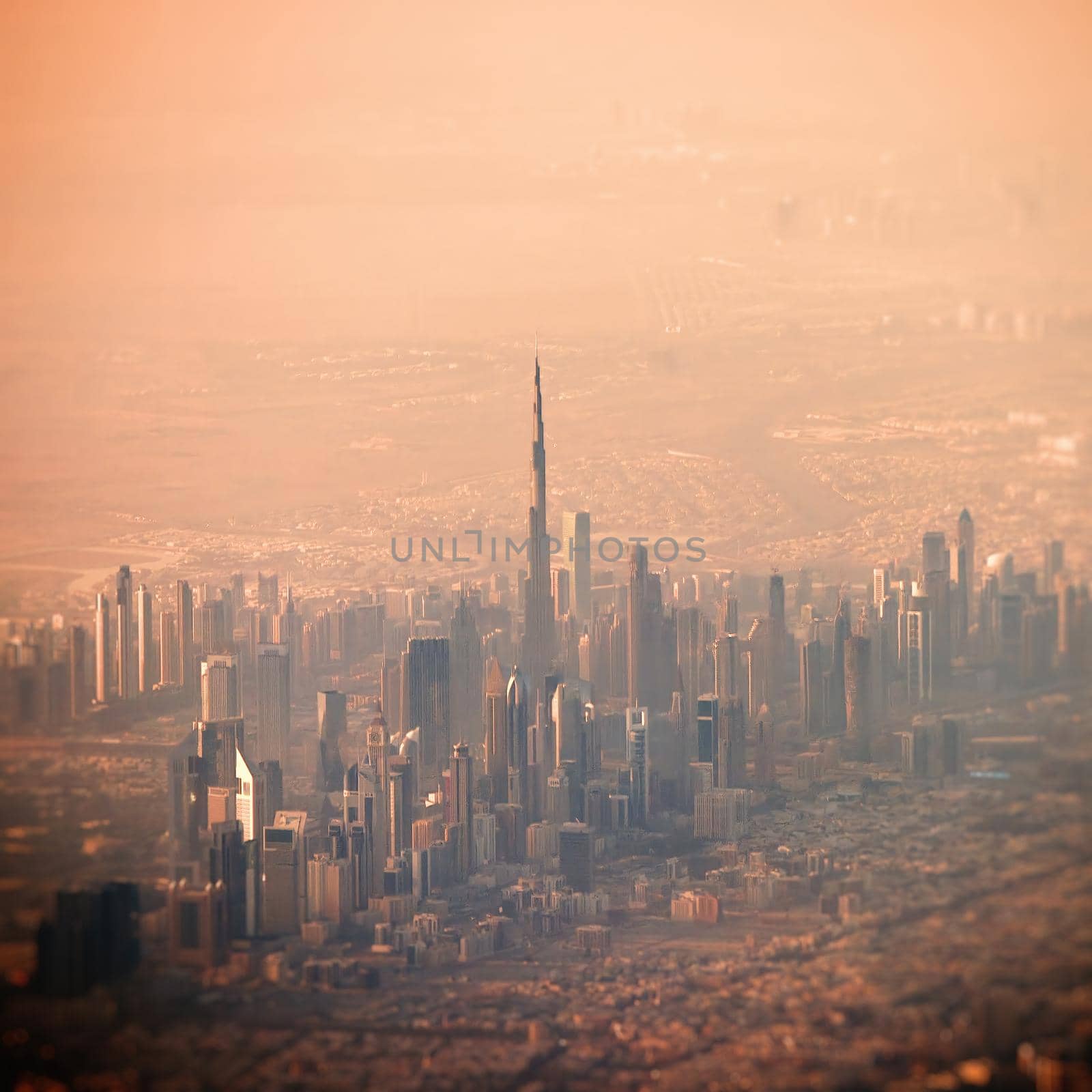 Aerial view of center of Dubai, United Arab Emirates or UAE. Business district in a smart city. Skyscrapers and high-rise buildings at dawn.