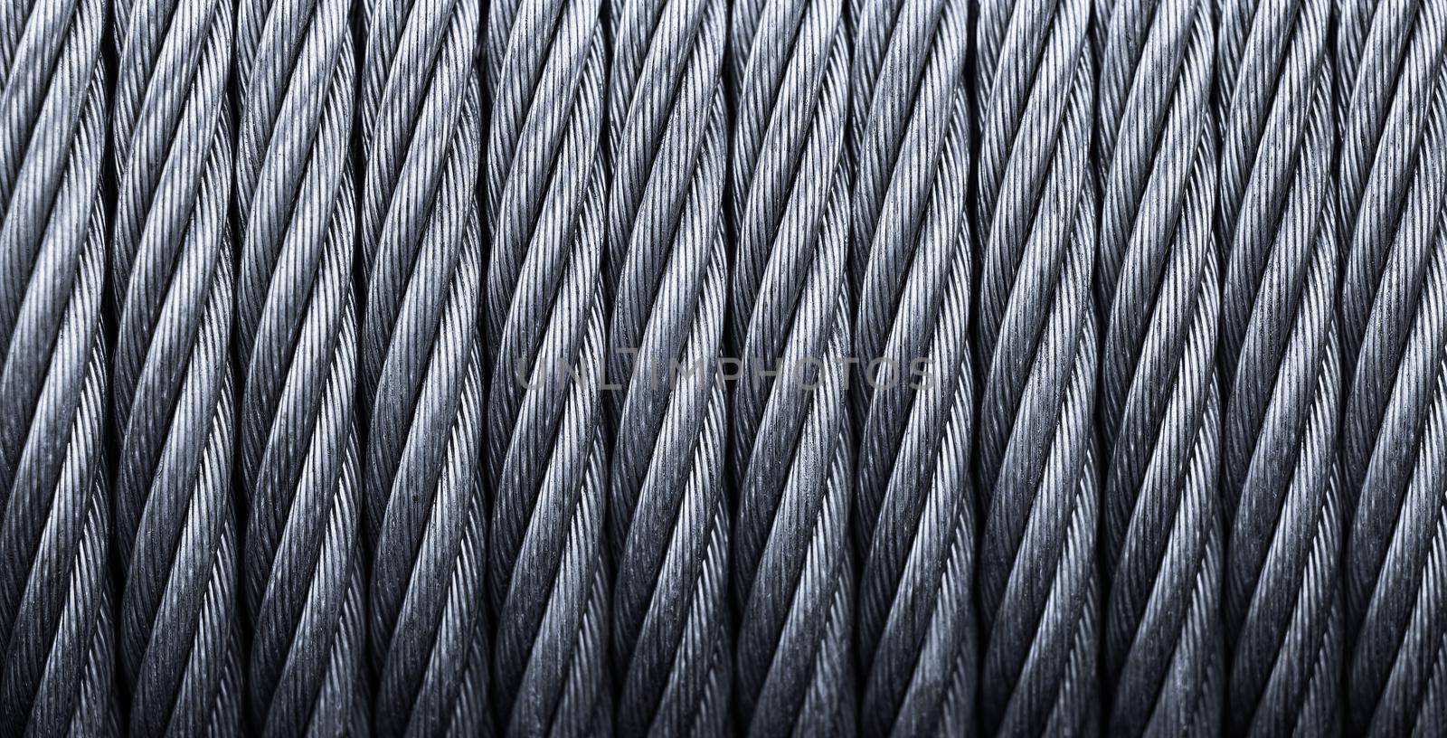Metal cable winch. Steel rope winch close-up. Strong still background by EvgeniyQW