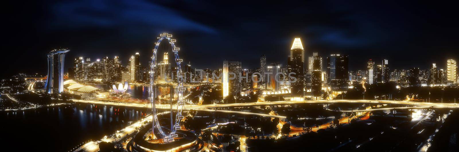 Beautiful Gold view of Singapore night. Skyscrapers at the Marina Bay. Panorama of the sights of Singapore.