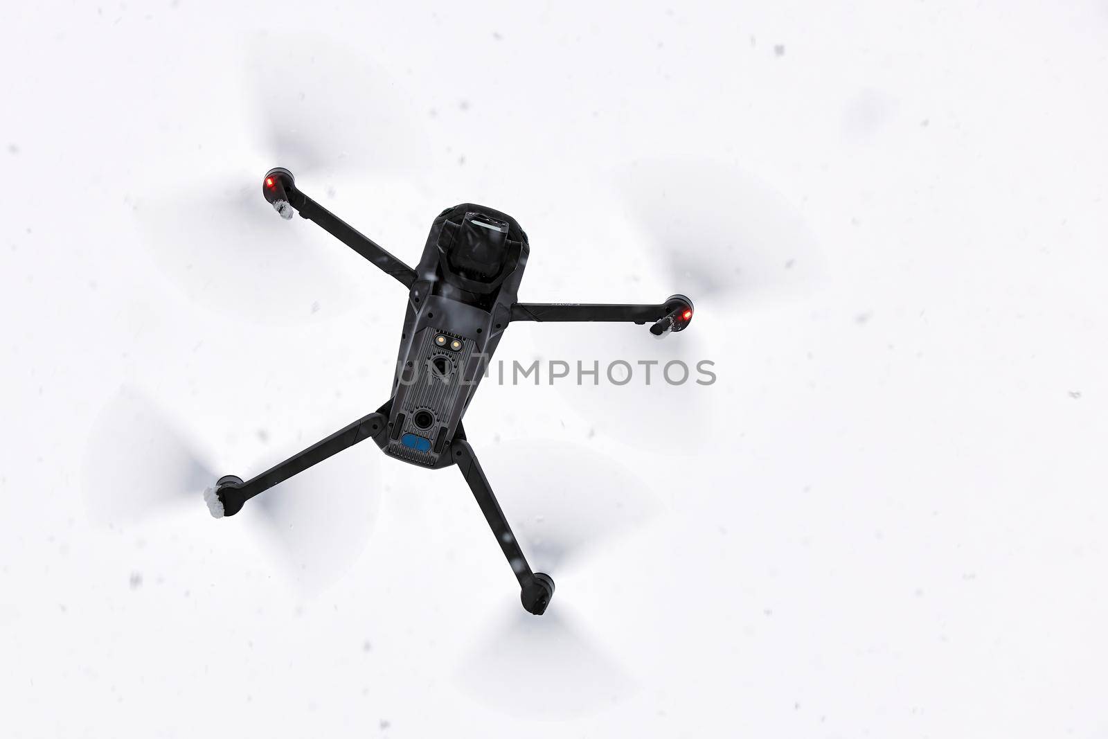 New DJI Mavic 3 bottom view, flying in snow conditions. DJI Mavic 3 one of the most portable drones in the market, with Hasselblad camera. 25.01.2022 Rostov-on-Don, Russia.
