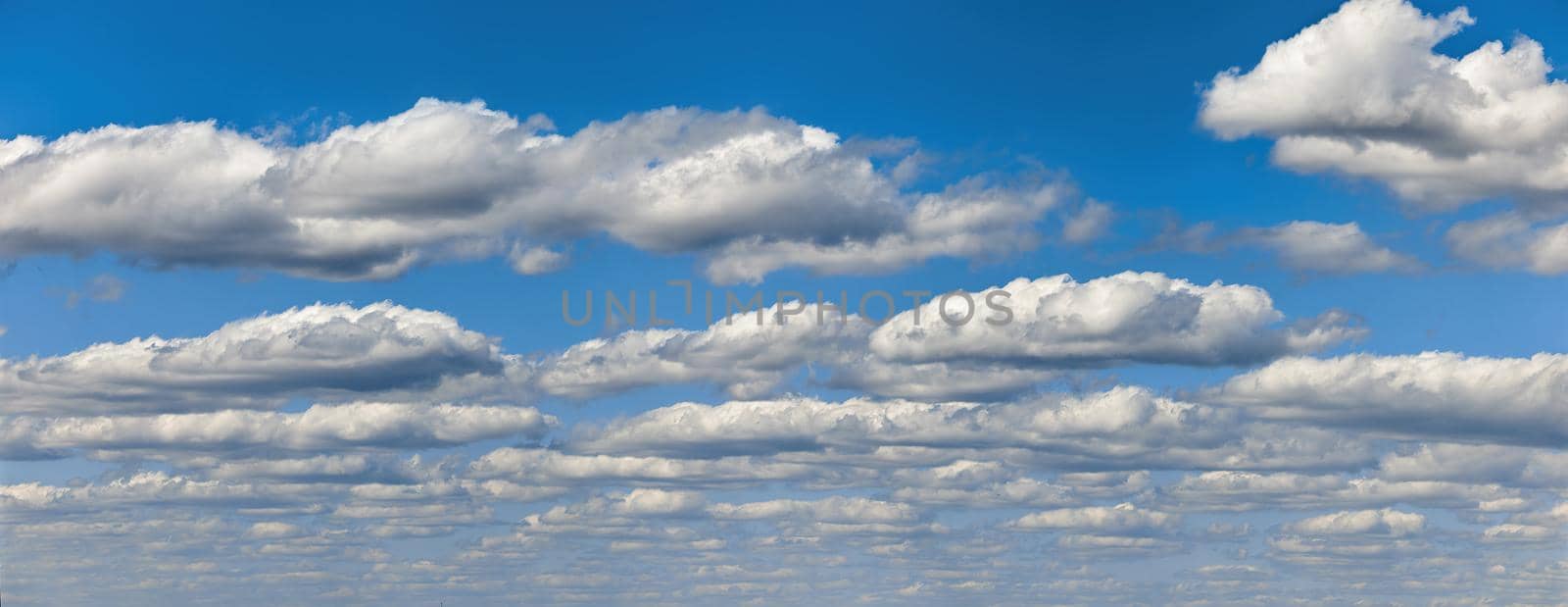 Beautiful panorama of the sky. Panorama of the sky in the clouds. Clouds float across the blue sky by EvgeniyQW