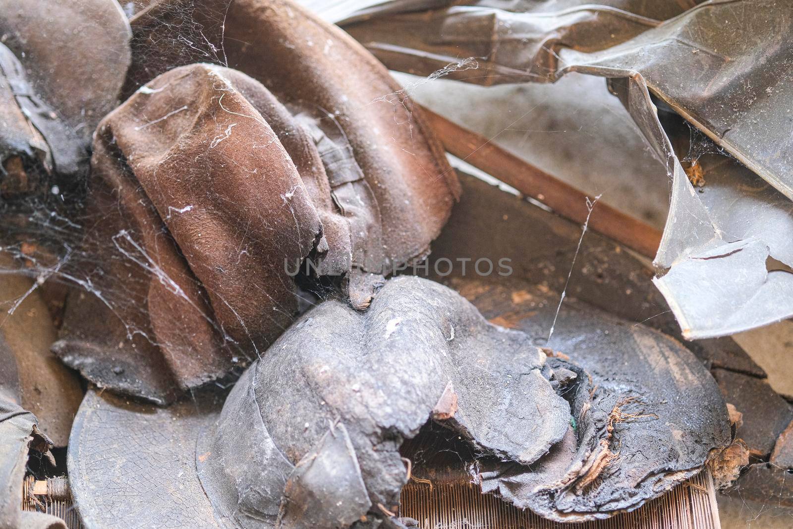 hat ruined by abandoned fire with cobwebs. High quality photo