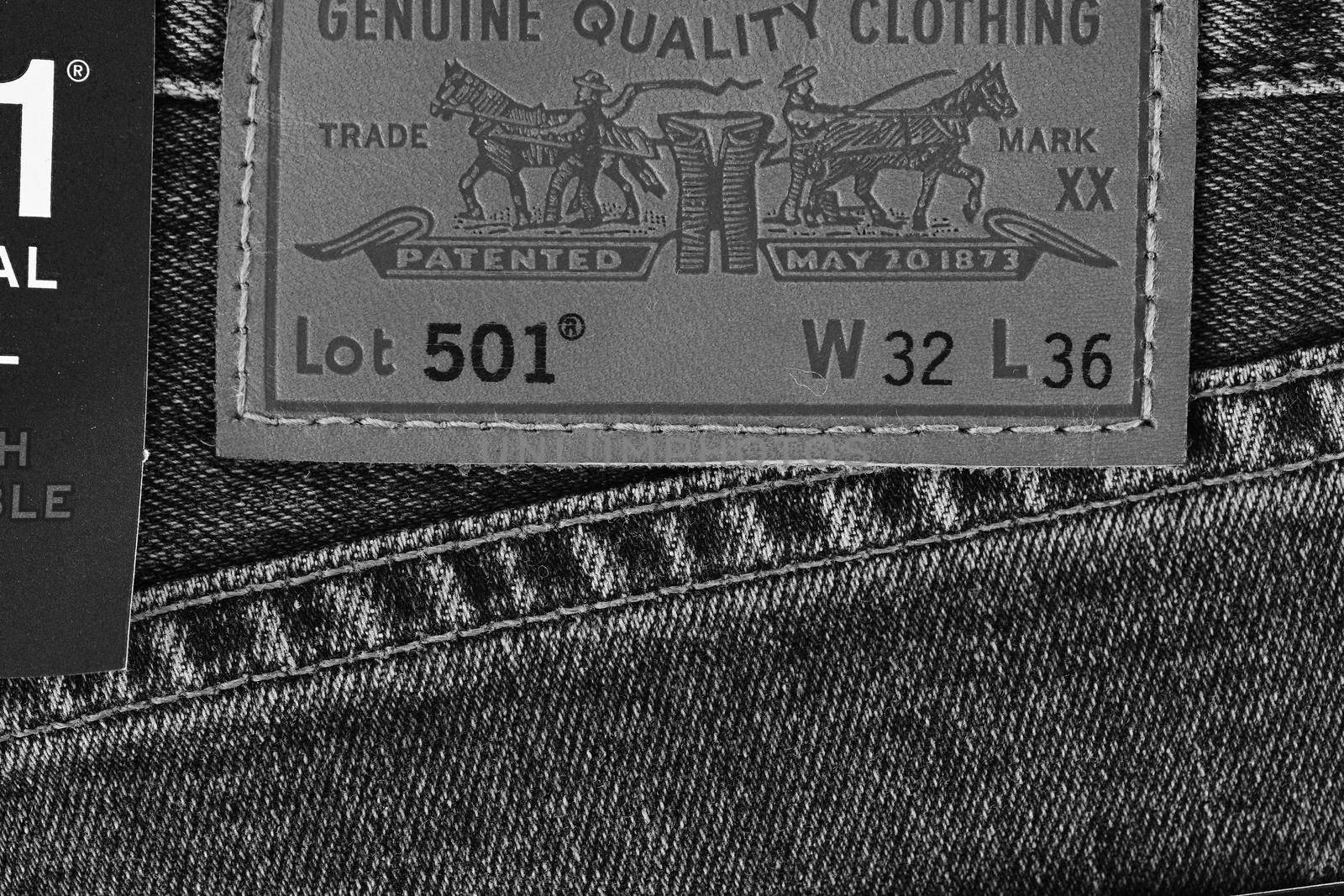 Close up of the details of new LEVI'S 501 Jeans. Seams and denim texture close-up. Classic jeans model. LEVI'S is a brand name of Levi Strauss and Co, founded in 1853. 31.12.2021, Rostov, Russia.