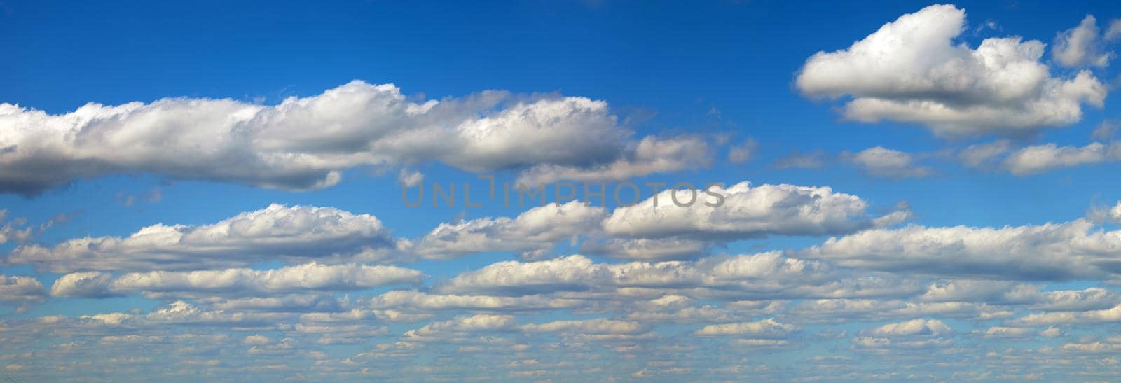 Beautiful panorama of the sky. Panorama of the sky in the clouds. Clouds float across the blue sky. by EvgeniyQW