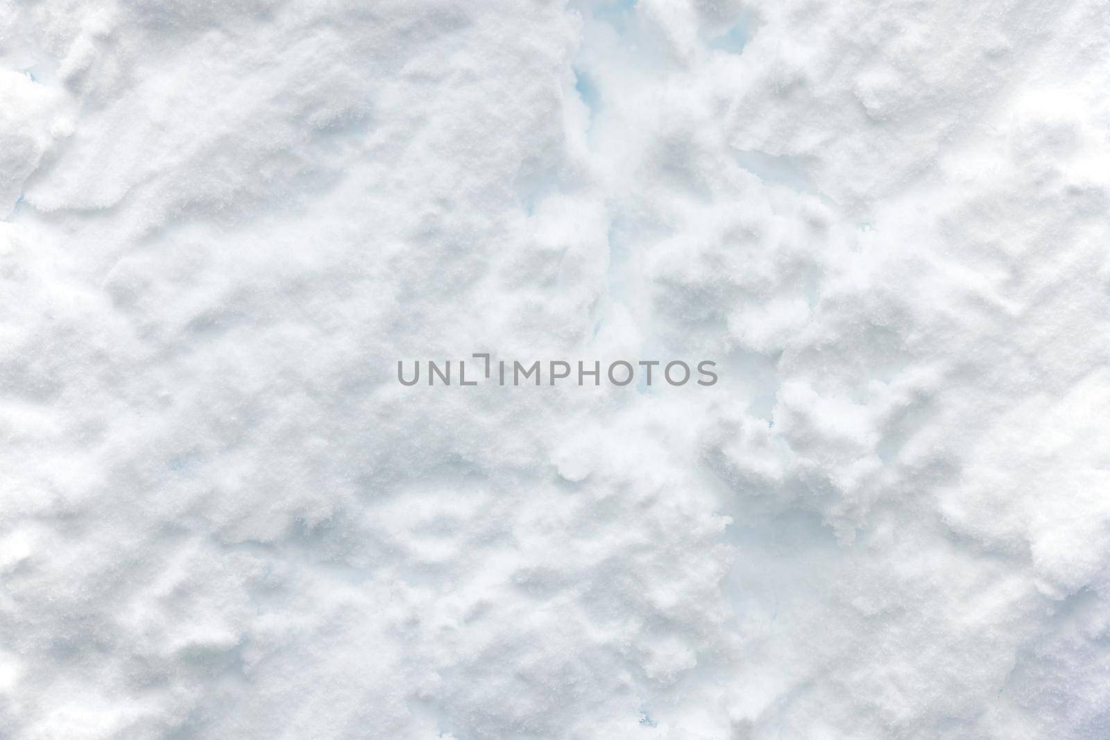 Wall of snow. Snowdrift surface, Winter background. The texture of snow removed with a bucket. Removed compressed snow by EvgeniyQW