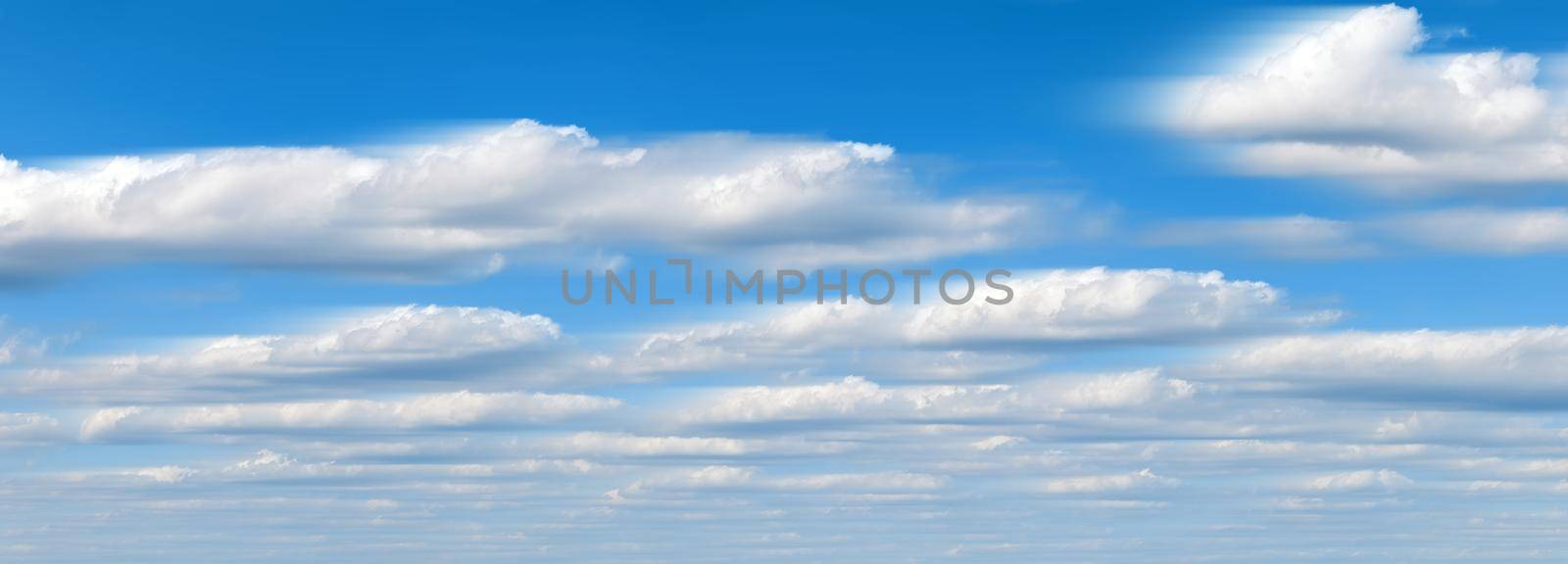 Beautiful panorama of the sky. Panorama of the sky in the clouds. Clouds float across the blue sky, long exposure frame by EvgeniyQW