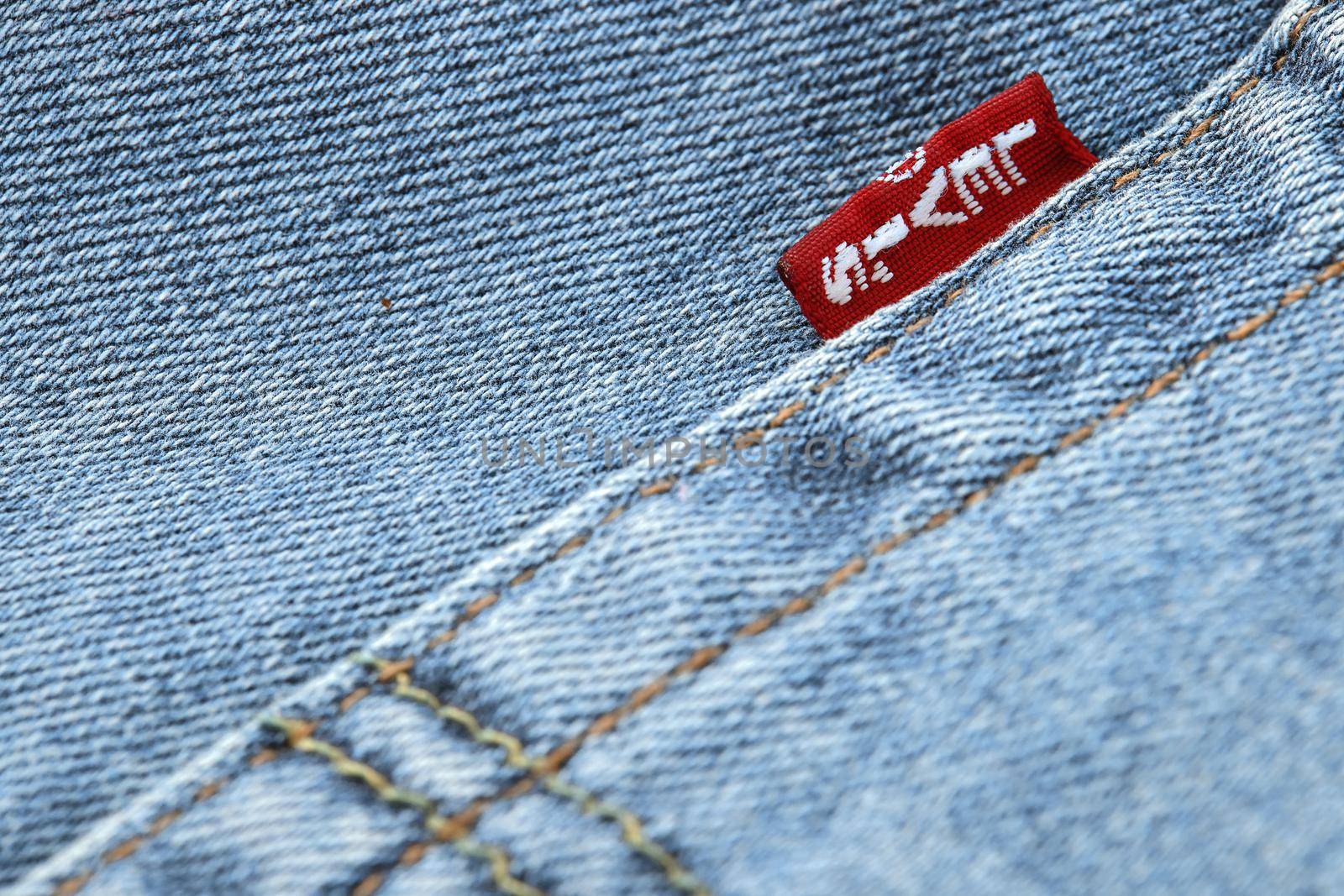 Close up of the details of new LEVI'S 501 Jeans. Seams and denim texture close-up. Classic jeans model. LEVI'S is a brand name of Levi Strauss and Co, founded in 1853. 31.12.2021, Rostov, Russia.