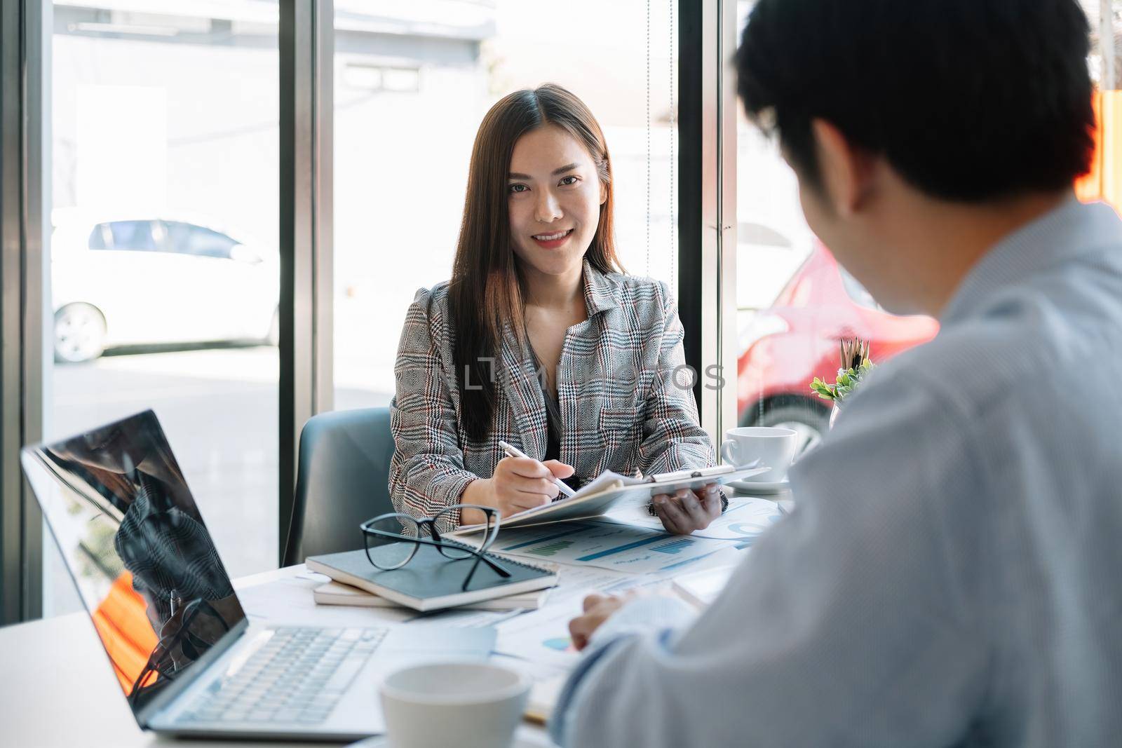 Portrait business asian female working together planning analyzing financial document data charts and graphs in Meeting and successful teamwork Concept.