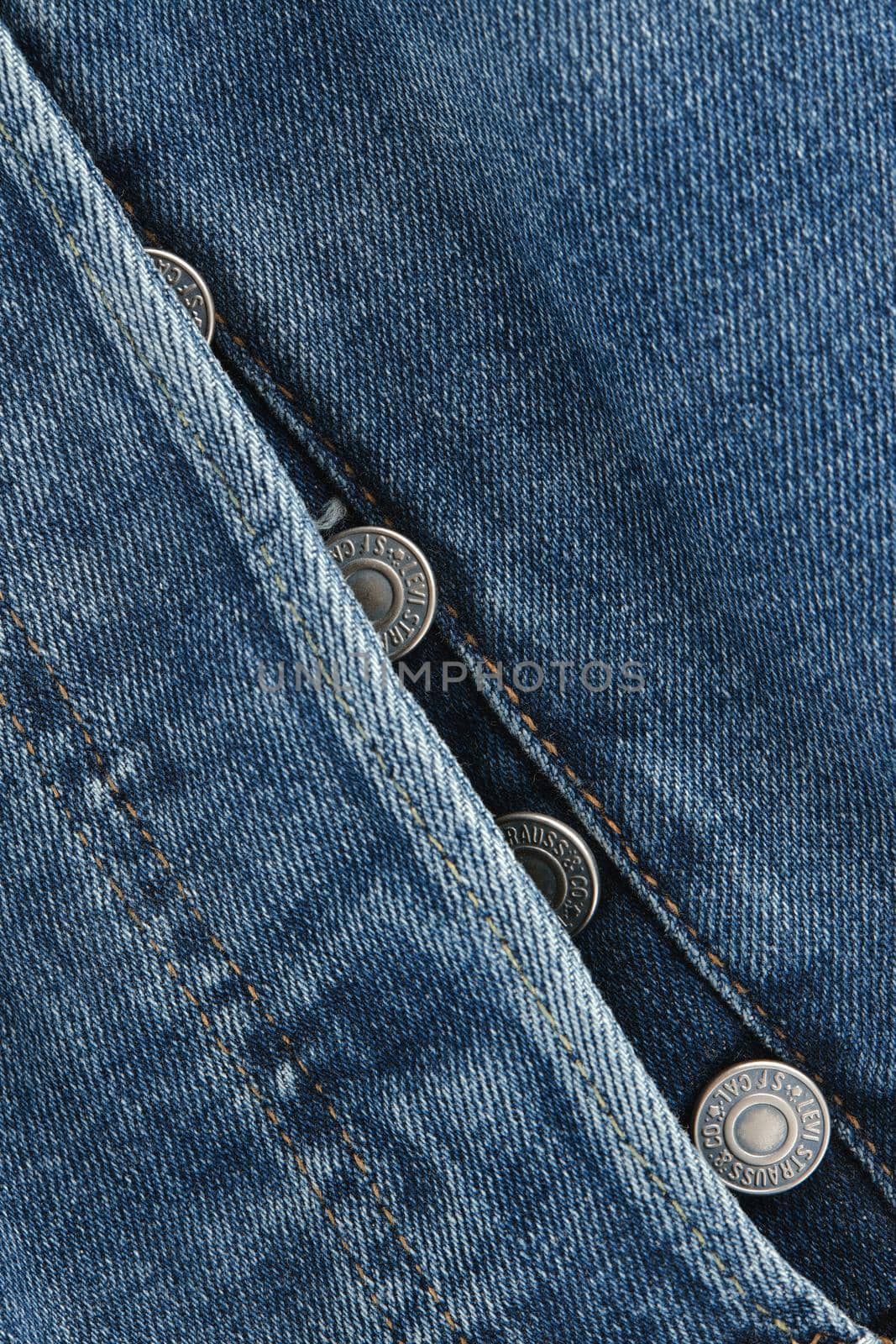 Close up of the details of new LEVI'S 501 Jeans. Buttons and seams close-up. Classic jeans model. LEVI'S is a brand name of Levi Strauss and Co, founded in 1853. 31.12.2021, Rostov, Russia.