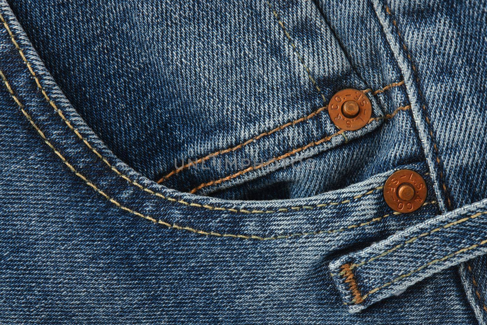 Close up of details of new LEVI'S 501 Jeans. Buttons and seams and pockets close-up. Classic jeans model. LEVI'S is a brand name of Levi Strauss and Co, founded in 1853. 31.12.2021, Rostov, Russia by EvgeniyQW