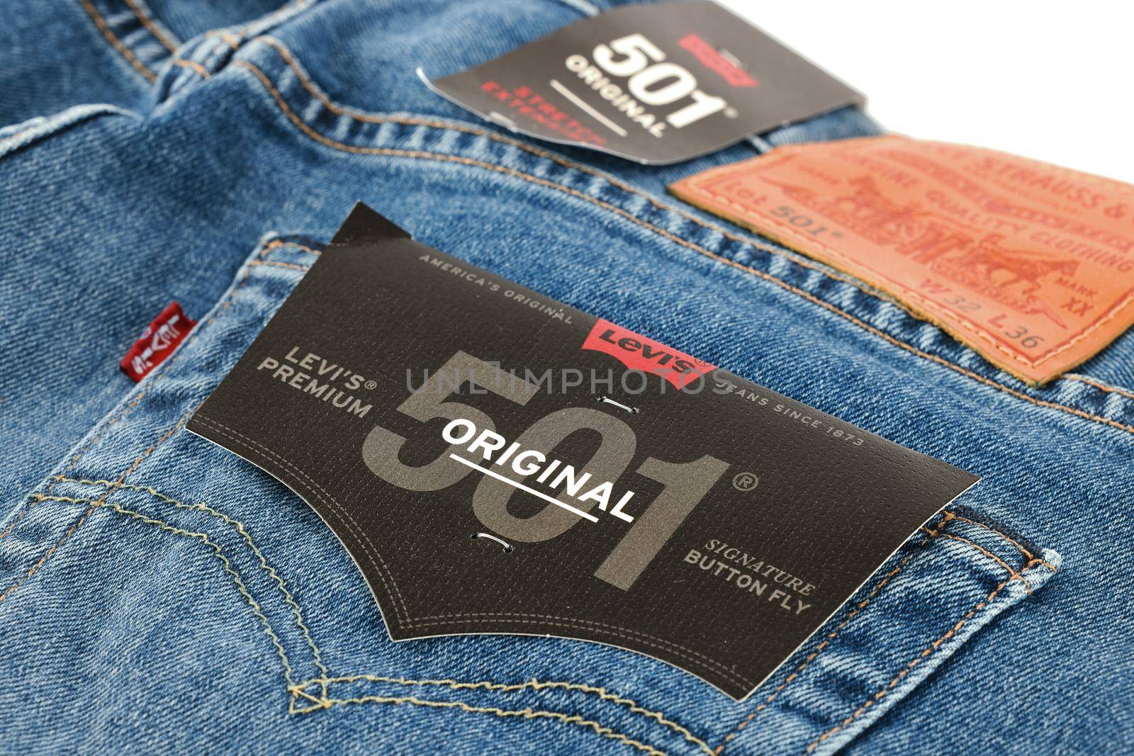 Levi's logo and badges is displayed on Levi Strauss 501 jeans. New LEVI'S 501 Jeans. Classic jeans model. 31.12.2021, Rostov, Russia.
