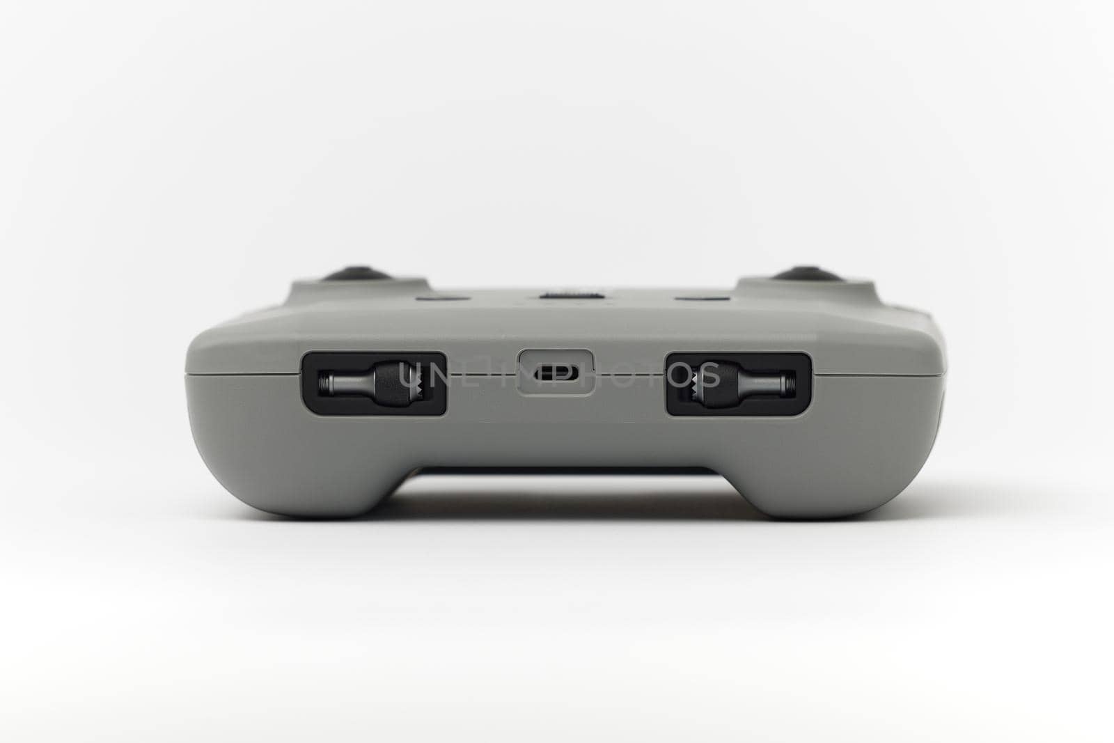 DJI remote control on white background. Control stick of the DJI Mavic 3 drone. Unpacking and configuring the DJI copter. 17.12.2021, Rostov region, Russia.