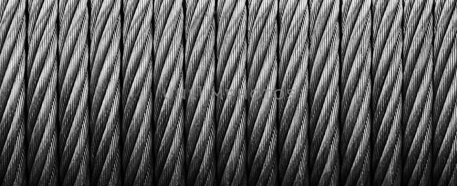 Metal cable winch. Steel rope winch close-up. Strong still background by EvgeniyQW