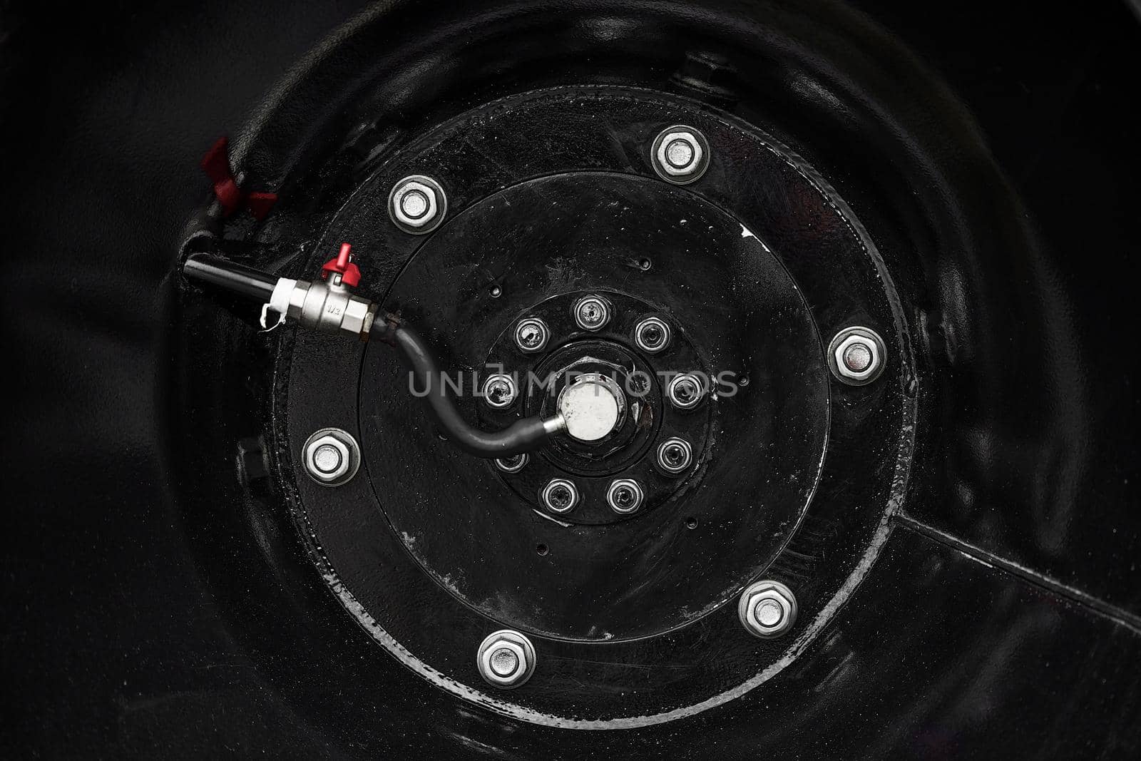 Low pressure tires, with automatic tire pumping system. Extreme patency. Giant Wheels of an all-terrain vehicle. ATV monster car.