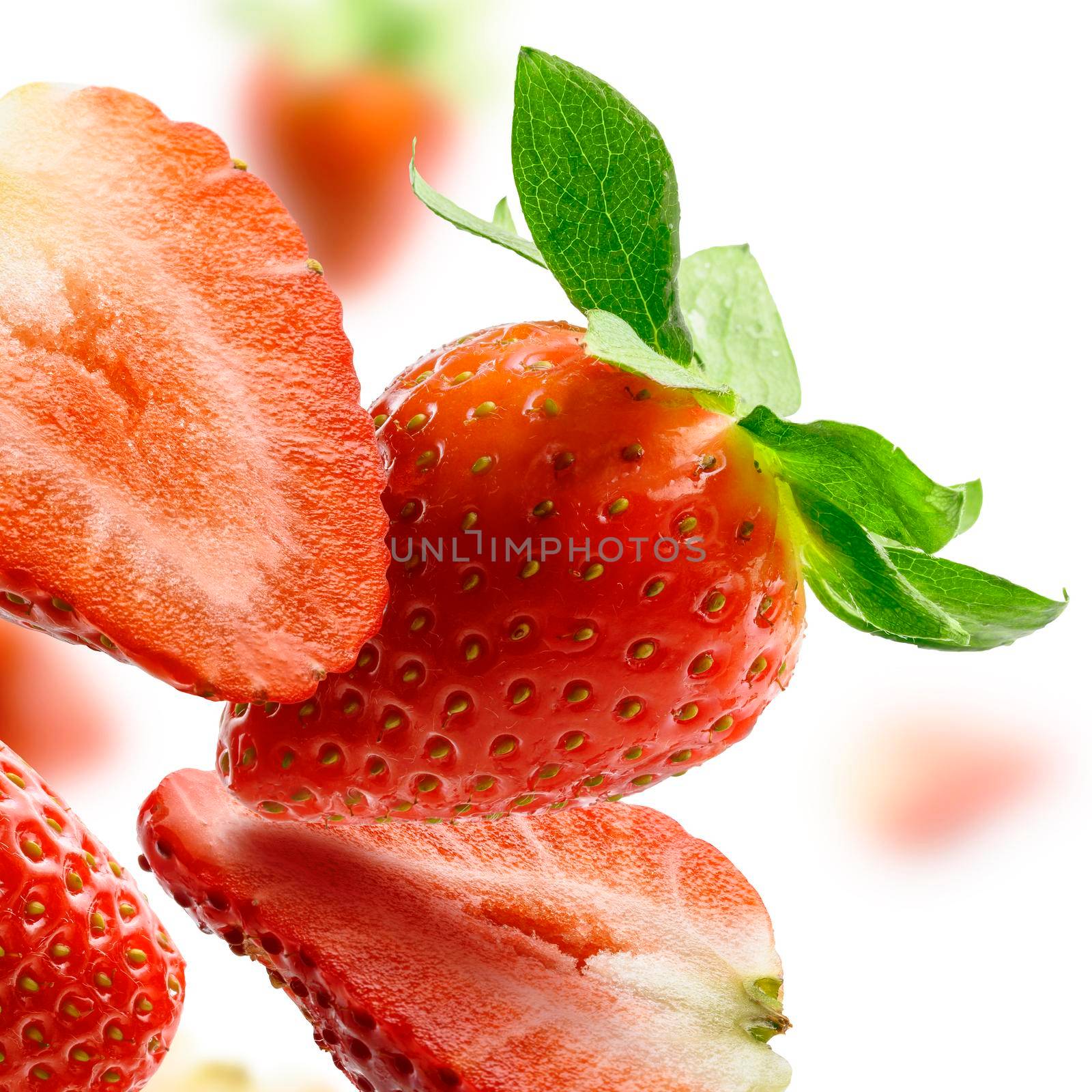 Strawberry close-up isolated on white background.