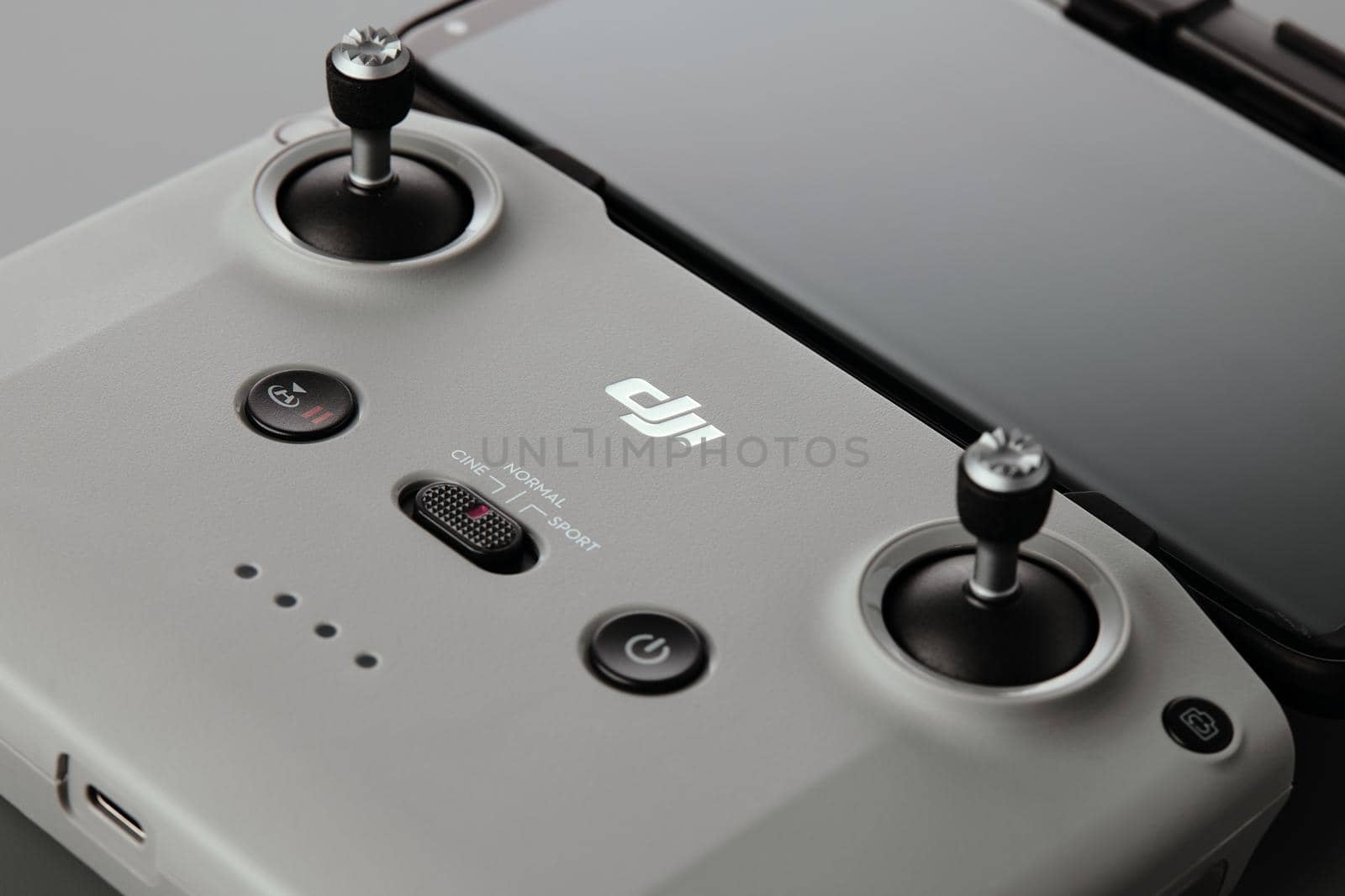 DJI remote control. Control stick of the DJI Mavic 3 drone remote control with mobile phone attached. Unpacking and configuring the DJI copter. 17.12.2021, Rostov region, Russia.
