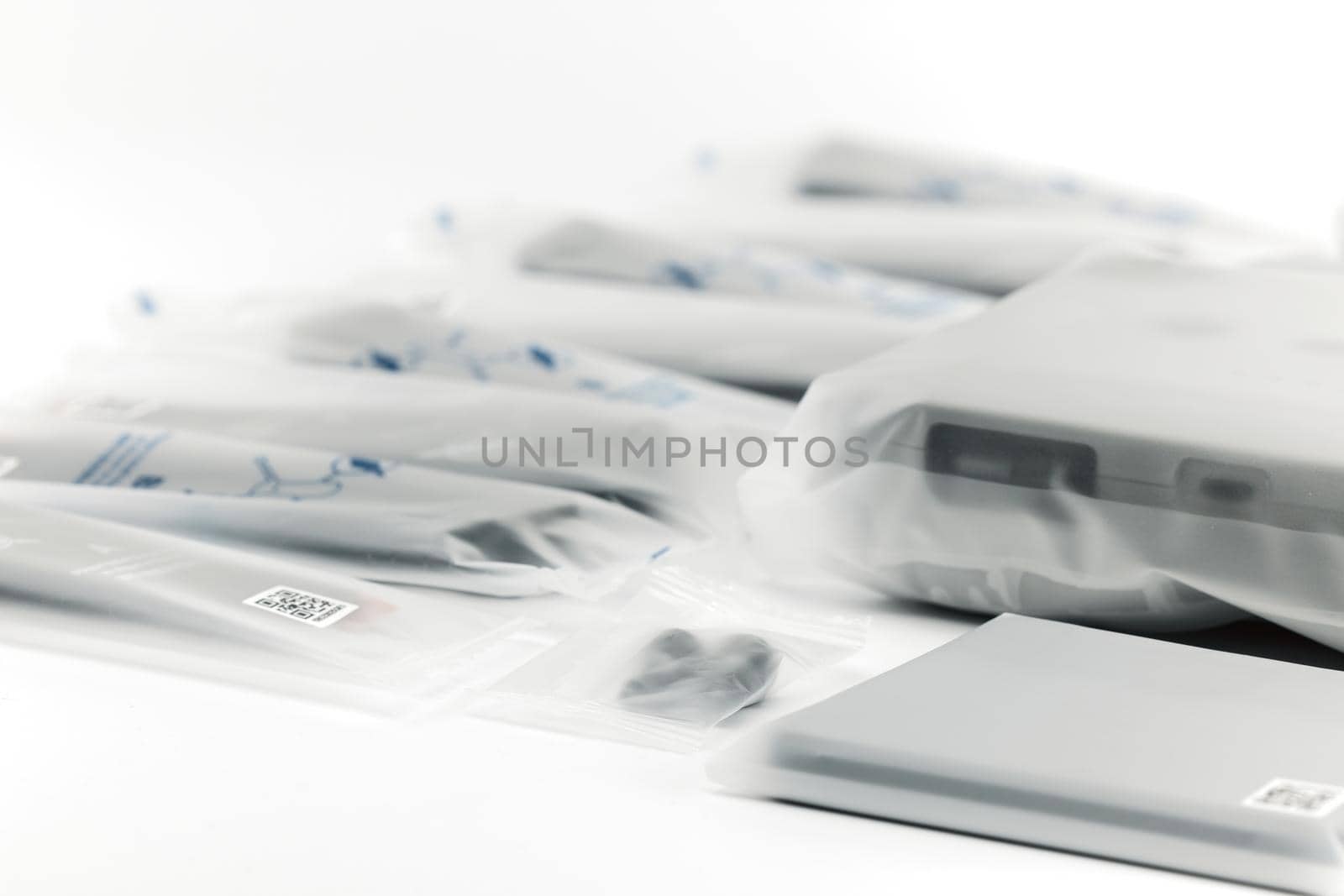 New DJI Mavic 3 drone on a white background when unpacking. Parts of the delivery set in the original packaging. DJI world leader developer and manufacturers in UAV. 17.12.2021, Rostov region, Russia.