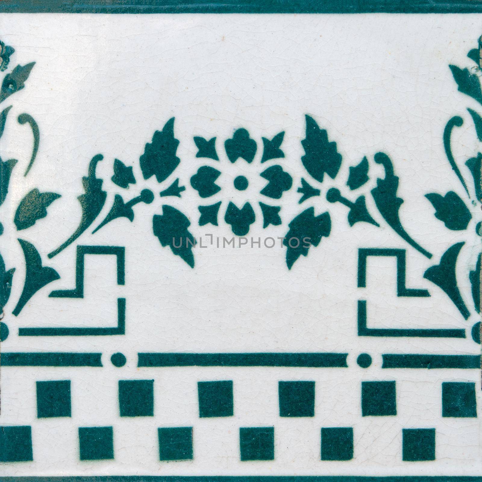 Traditional spanish ceramic tiles in yellow, white and blue