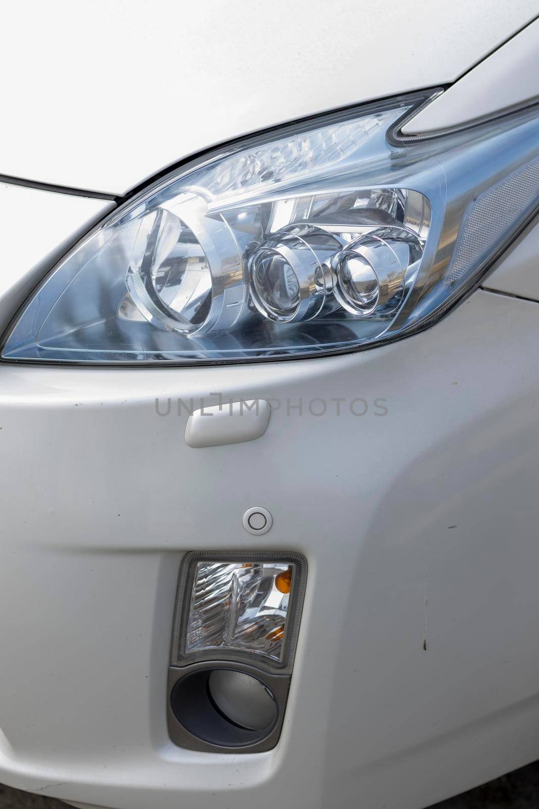 Car headlamp with indicator and sensor by Bilalphotos