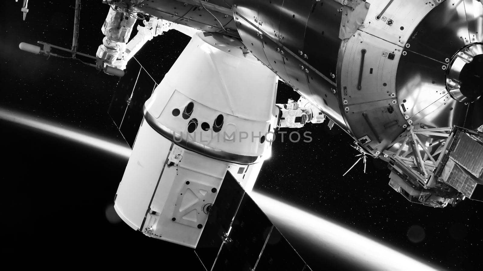 SpaceX Crew Dragon spacecraft is docked to the Space Station. Elements of this image furnished by NASA.
