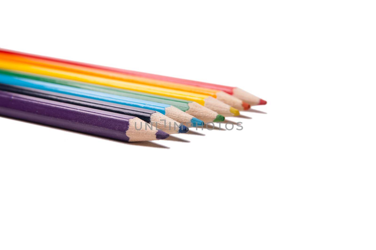 Colour pencils isolated on white background close up