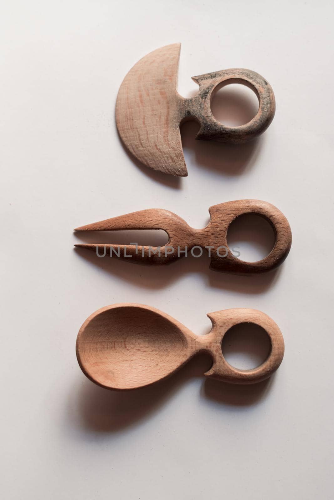 Handmade Wooden Spoons for hiking and outdoor activities. Craftsmanship and artisan concept by dotshock