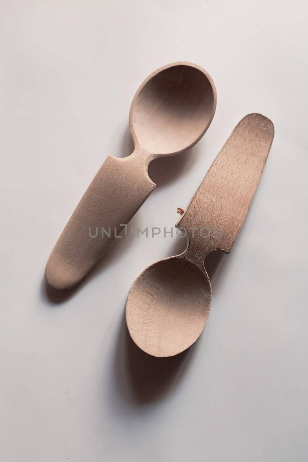 Handmade Wooden Spoons for hiking and outdoor activities. Craftsmanship and artisan concept by dotshock