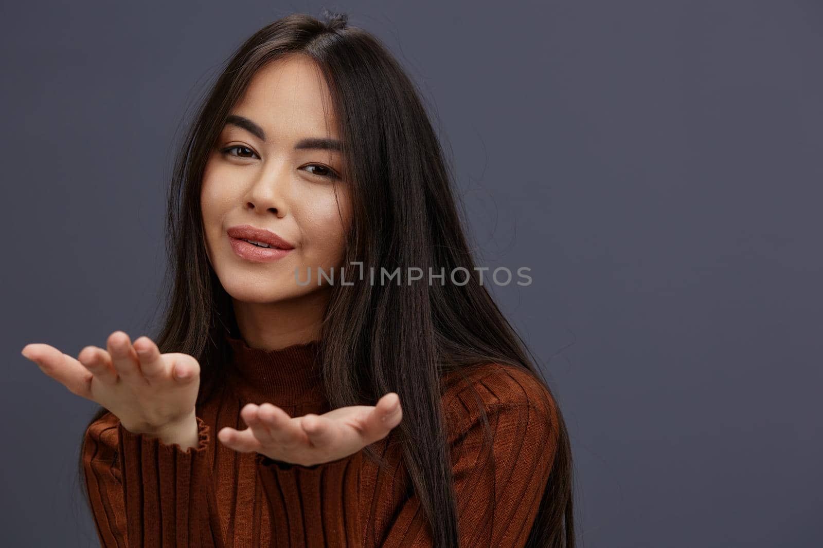 Brunette fun brown sweater posing casual wear isolated background by SHOTPRIME