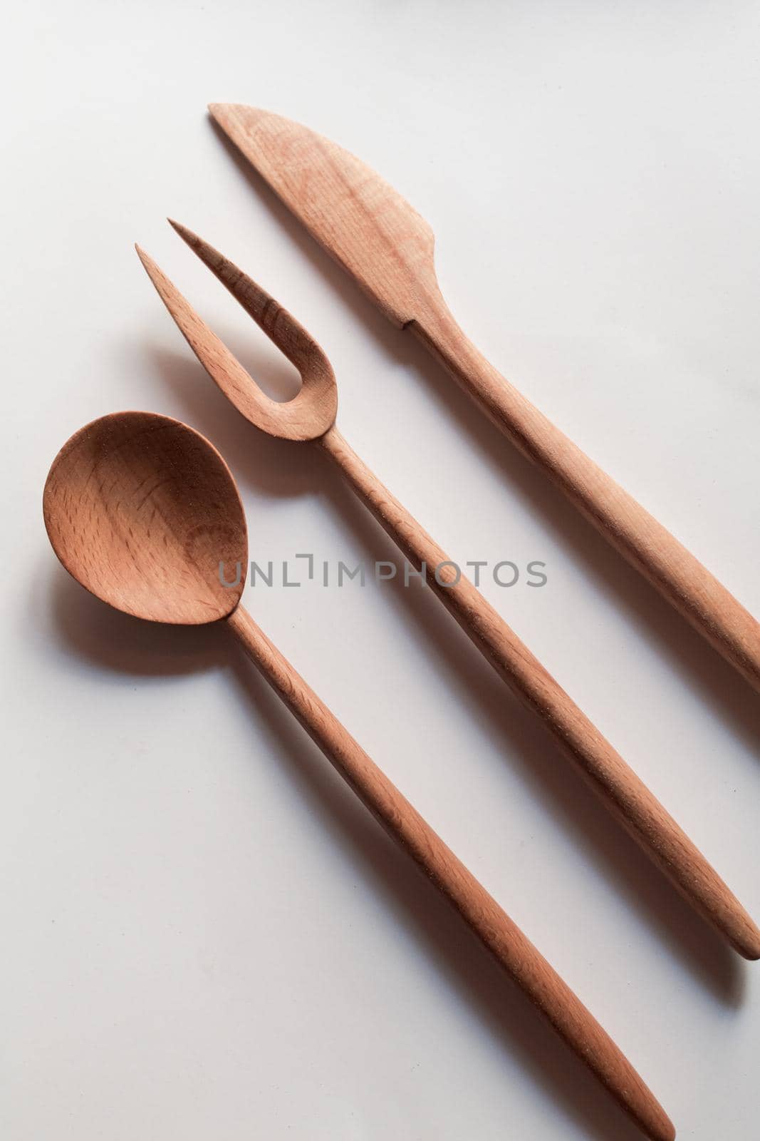 Handmade Wooden Spoons for hiking and outdoor activities. Craftsmanship and artisan concept. High quality photo
