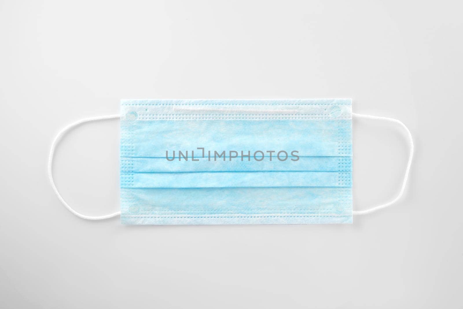 Medical mask, Medical protective mask on white background. Disposable surgical face mask cover the mouth and nose. Healthcare and medical concept.