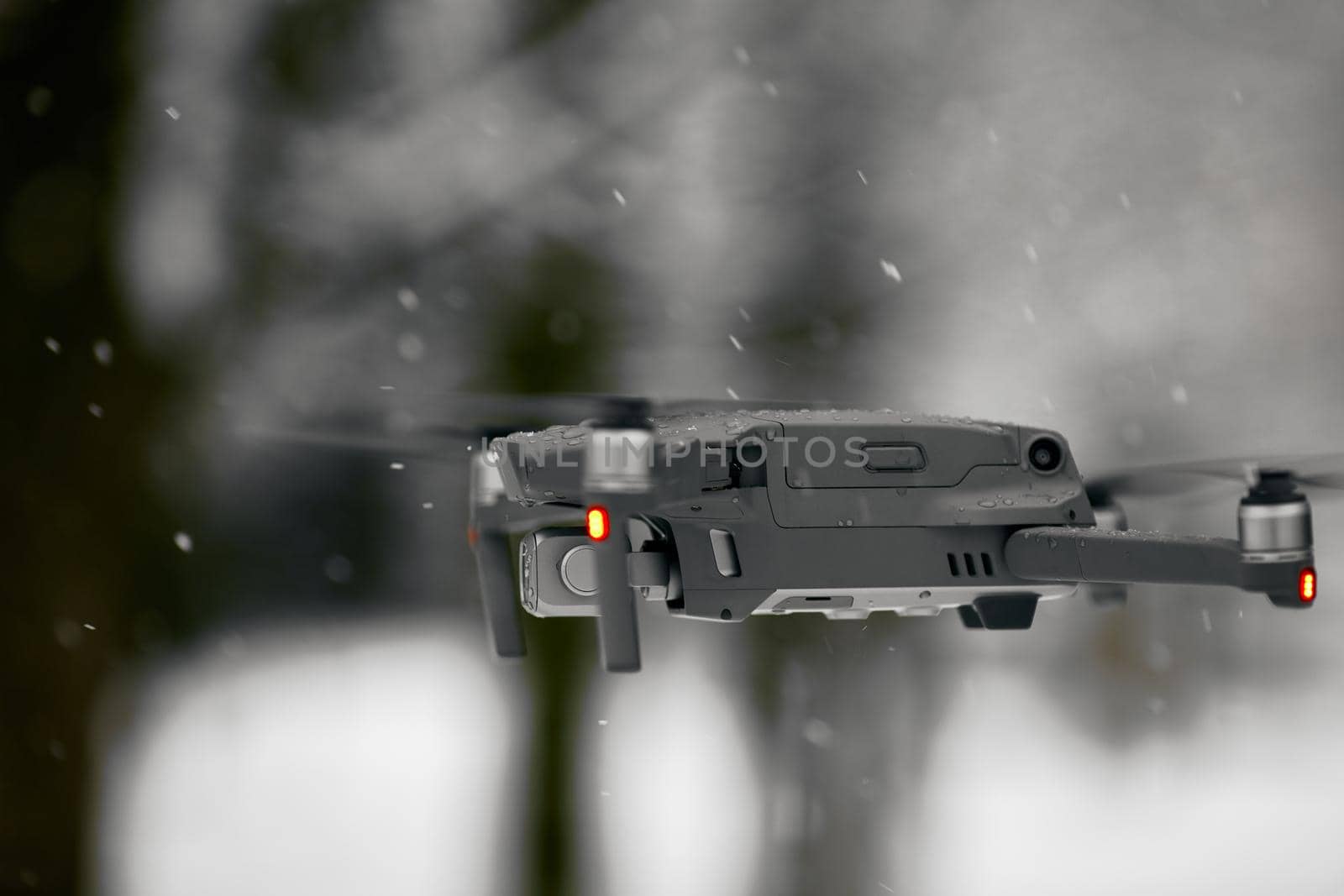 DJI Mavic 2 Pro, flying in wet snow conditions. DJI Mavic 2 Pro one of the most portable drones in the market, with Hasselblad camera. 07.12.2018 Rostov-on-Don, Russia by EvgeniyQW