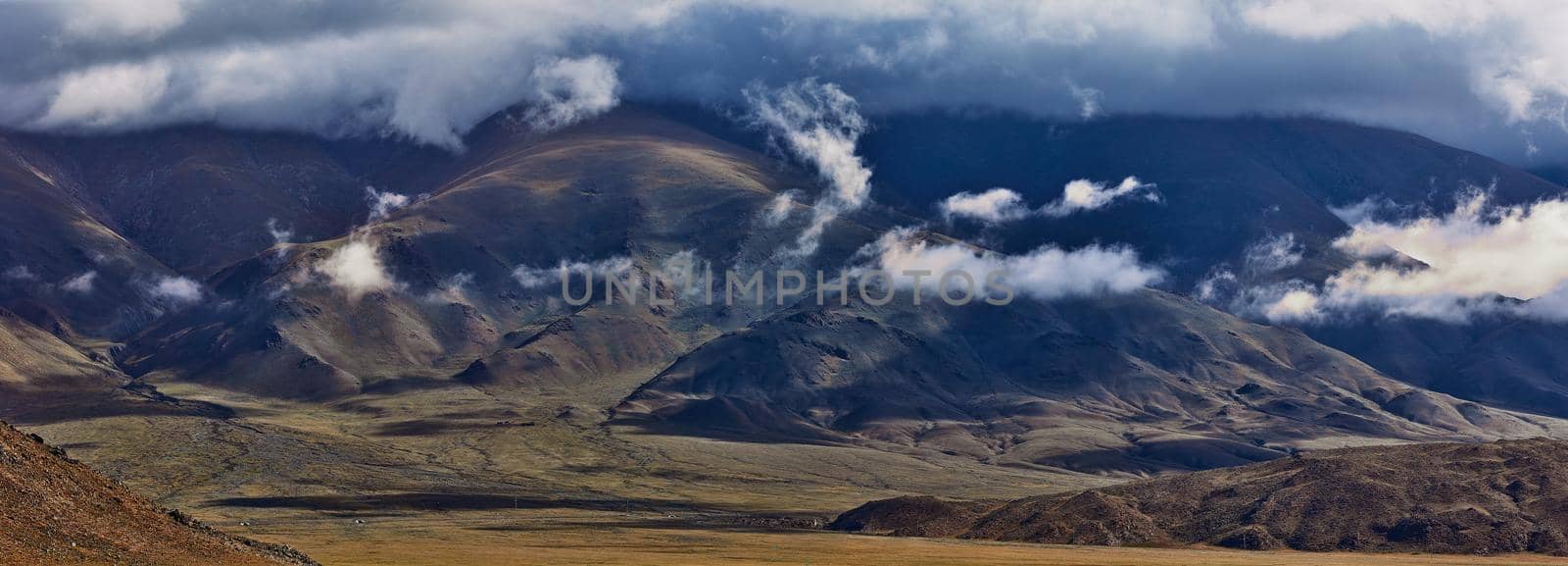 Pasture in the mountains of Mongolia. Landscapes of Mongolia, panorama of mountains in the Gobi desert.