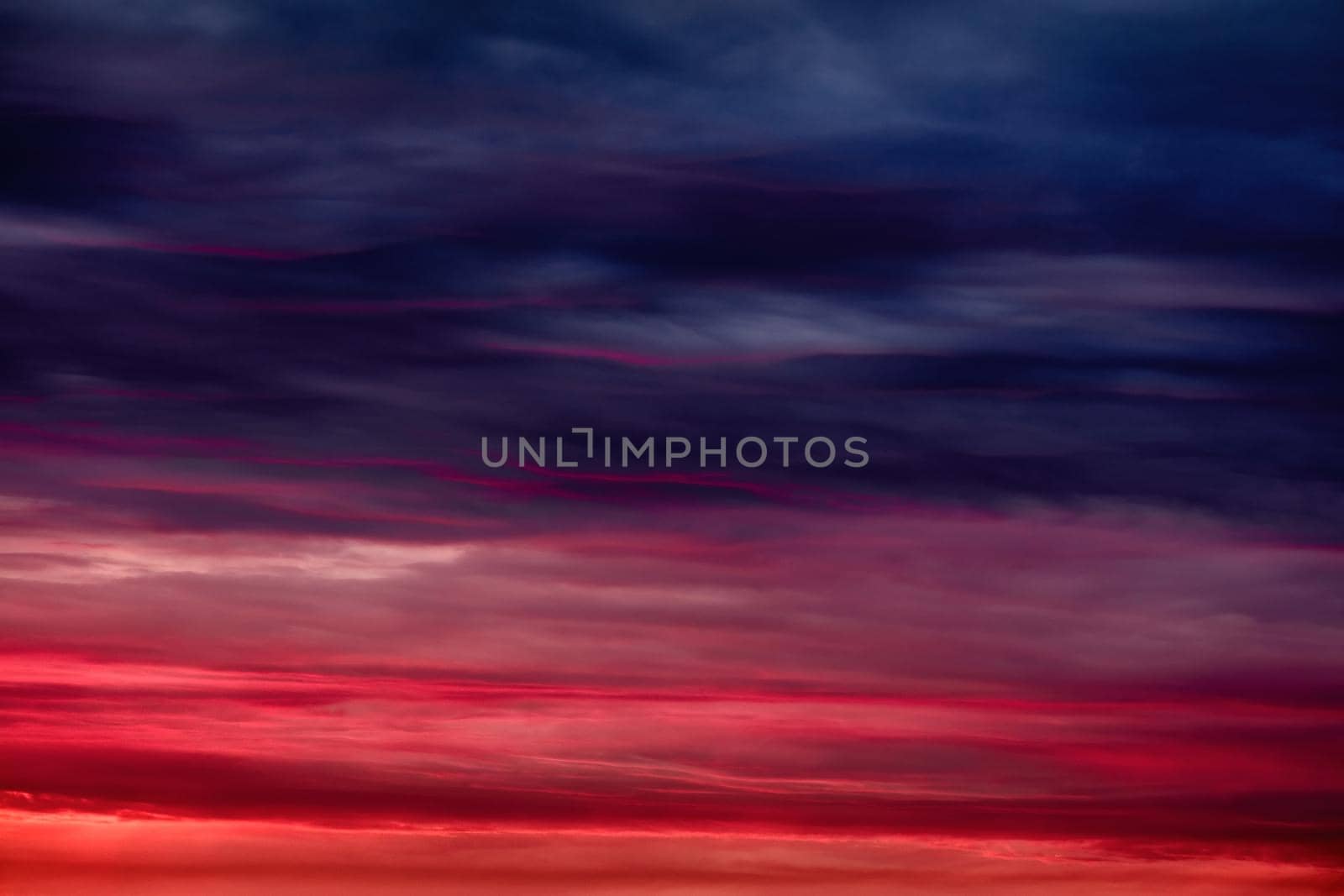 Colorful sunset with clouds in the evening. Abstract nature background. Dramatic and moody pink, purple and blue cloudy sunset sky by EvgeniyQW