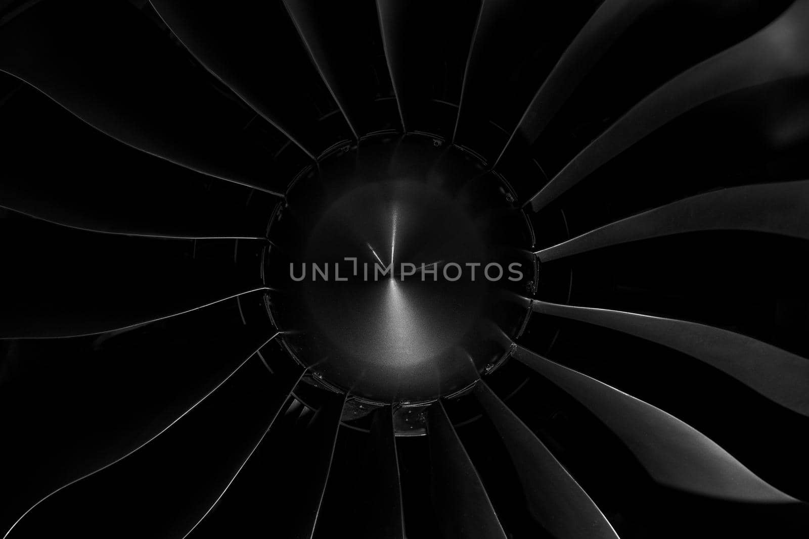 Modern turbofan engine. close up of turbojet of aircraft on black background. blades of the turbofan engine of the aircraft.