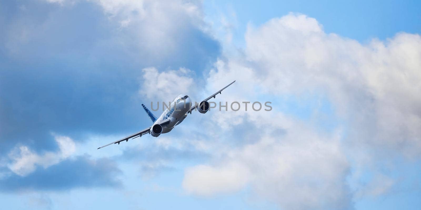 New Russian passenger aircraft MS-21-300 flying prototype of a new Russian civil airliner during test flights on MAKS 2019 airshow. ZHUKOVSKY, RUSSIA, AUGUST 29, 2019 by EvgeniyQW