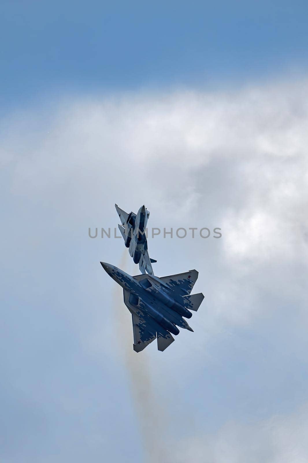 New Russian five generation's fighters SU 57 (T-50) shows aerial maneuver battle at Moscow International Aviation and Space Salon MAKS 2019. RUSSIA, AUGUST 28, 2019.