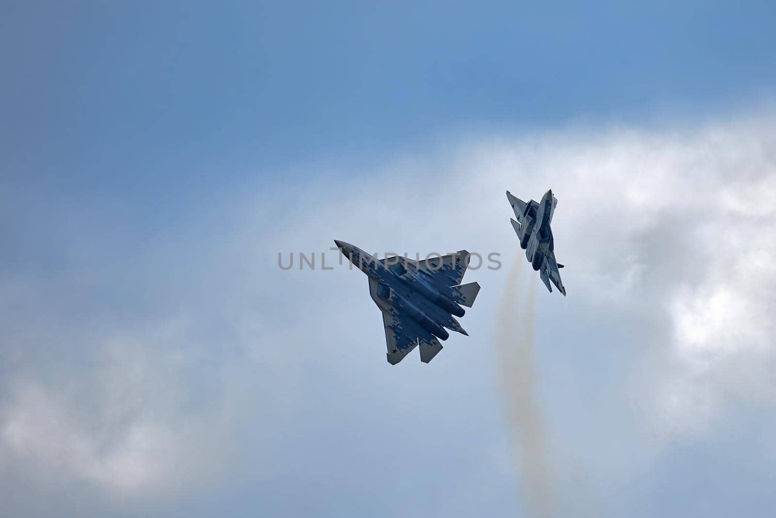 New Russian five generation's fighters SU 57, T-50 shows aerial maneuver battle at Moscow International Aviation and Space Salon MAKS 2019. RUSSIA, AUGUST 28, 2019 by EvgeniyQW