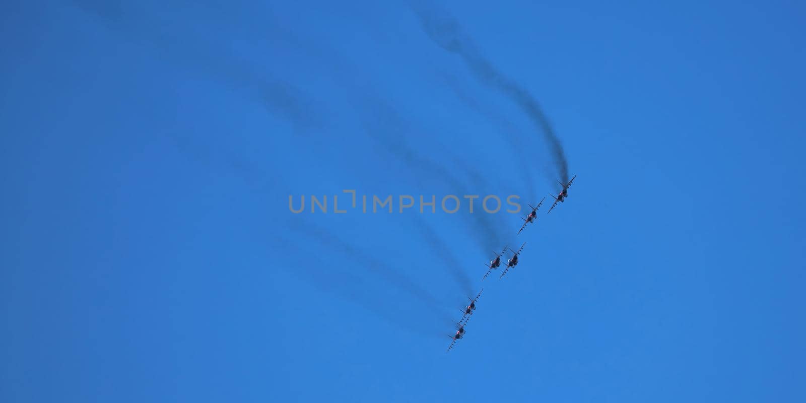 Airshow of the aerobatic team Strizhi (The Swifts). Aerobatic Team on fighters Mig-29, Russian Air Force, on at the International Aviation and Space salon MAKS 2019. ZHUKOVSKY, RUSSIA, 08,27,2019.