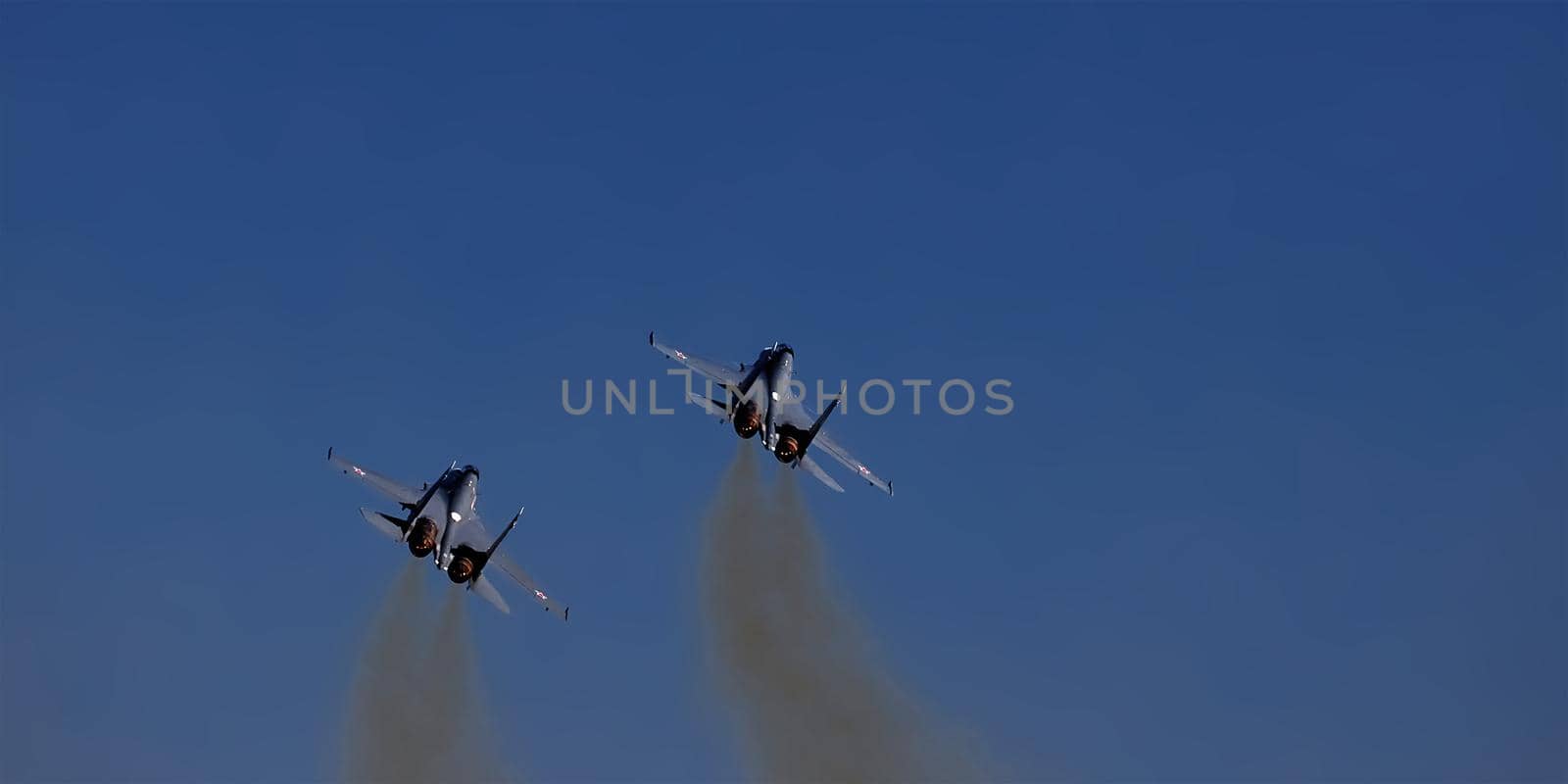 Sukhoi Su-30SM russian air force. Twin jet engine heavy fighter Su-30SM nato codification-Flanker. Fighter bomber jet aircraft fly aerobatic maneuver. MAKS 2019. RUSSIA, AUGUST 29, 2019 by EvgeniyQW