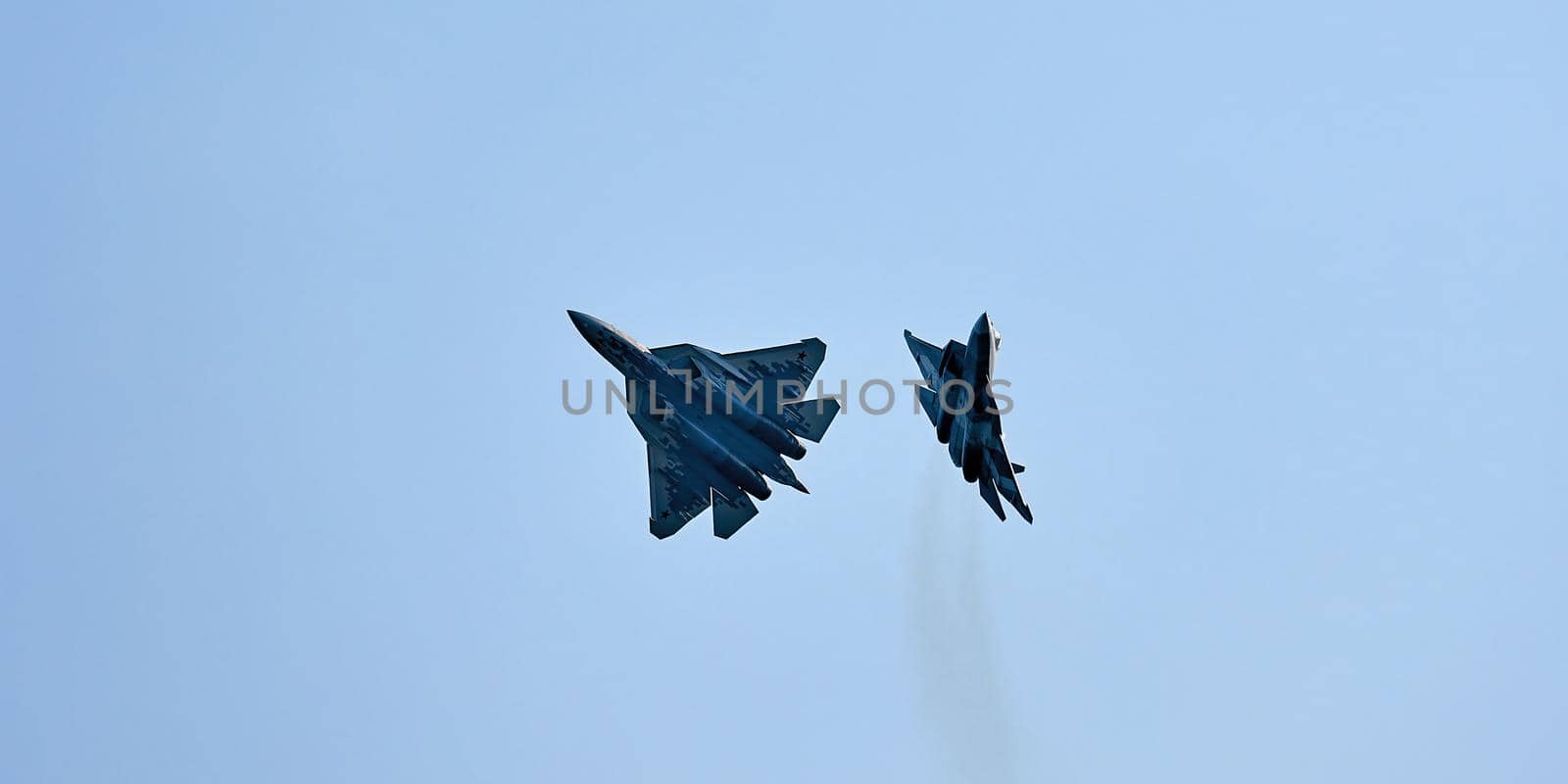 New Russian five generation's fighters SU 57 (T-50) shows aerial maneuver battle at Moscow International Aviation and Space Salon MAKS 2019. RUSSIA, AUGUST 28, 2019.